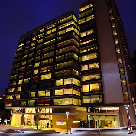 Hotel Crowne Plaza Istanbul Harbiye By Ihg Exterior foto The hotel at night